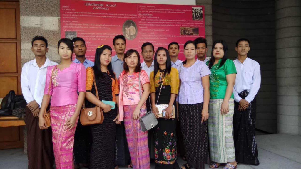The group of migrant workers from Myanmar before a hearing at the Bangkok Criminal Court in October 2017. The workers are facing criminal defamation charges for filing a complaint against a Thai chicken farm alleging labor rights violations. ©Private 2017