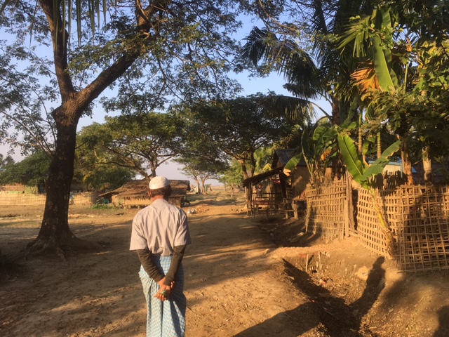 A Rohingya man walks a path on the outskirts of his village in Sittwe Township, Rakhine State. The government restricts Rohingya access to education, livelihoods, and freedom of movement, stemming from the denial of citizenship rights. ©Fortify Rights, 2019